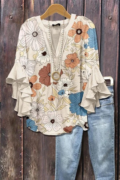 Florina™ - Blus med Blommönster, Volangärmar och Feminint Snitt